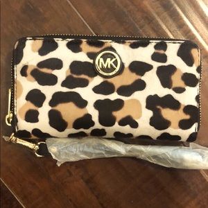 Brand new Micheal Kors Cheetah print wallet
